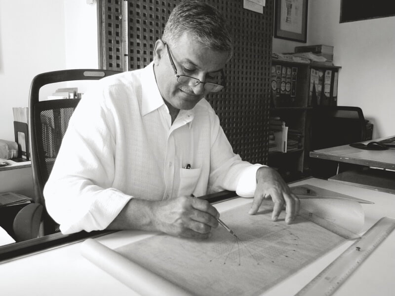 Snehal Shah at his desk at the M.C. Shah House